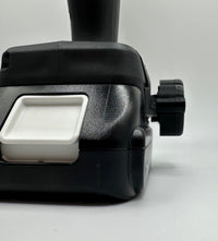 Makita AirTag holder close-up showing AirTag slot